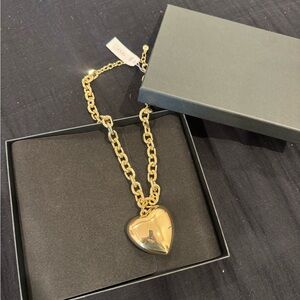 Chic shiny Gold puffy Heart Necklace🔥 get in on the trend! Fun to stack…